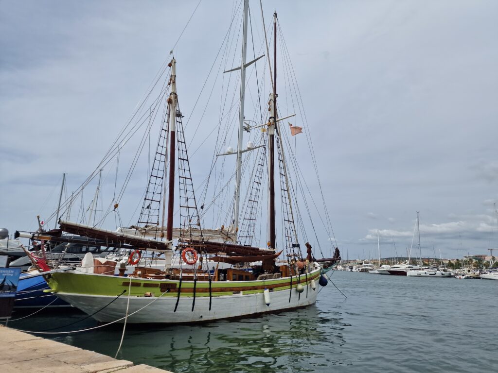 Alghero port and marina with boats in summer